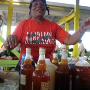 A mauby-maker at a St. Croix (U.S. Virgin Islands) market.