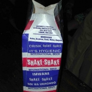 Sorghum beer from a Malawi brewery, sold in waxed paper cartons, like milk. The name \"Shake, Shake\" is what you do to the beer before opening the carton to re-integrate starch that settles. Photo by Glenn Austerfield