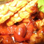 Fried tempeh matchsticks with peanuts and a sweet, sour, salty sauce.